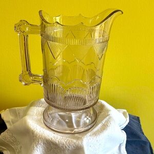 Antique etched glass pitcher, lavender hue. 5 cup capacity, scars, or markings.